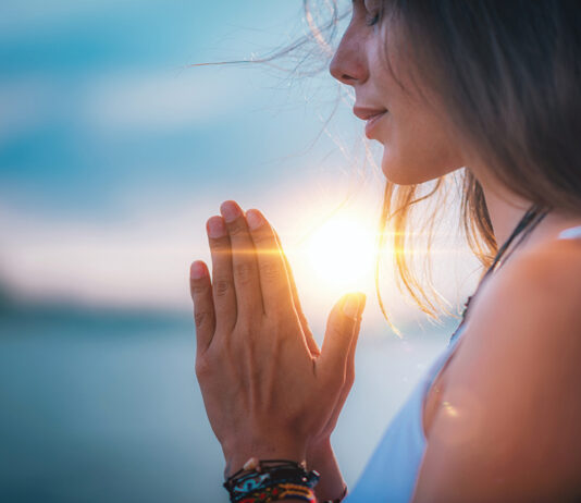 Meditating. Close Up Female Hands Prayer