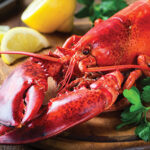 Red Lobster On Wooden Cutting Board