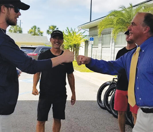 Sheriff Ford With Fla. Ga. Line Bike Donation