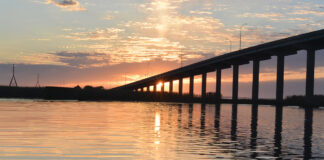 River Sunrise With Bridge And Clouds