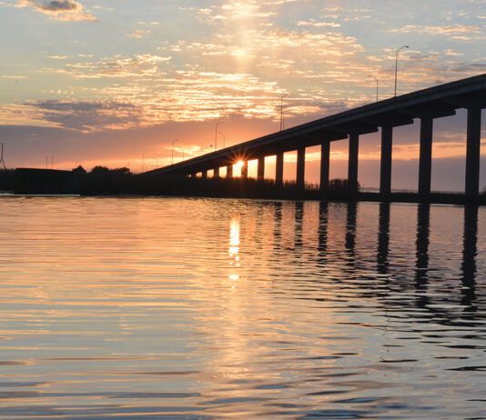 River Sunrise With Bridge And Clouds