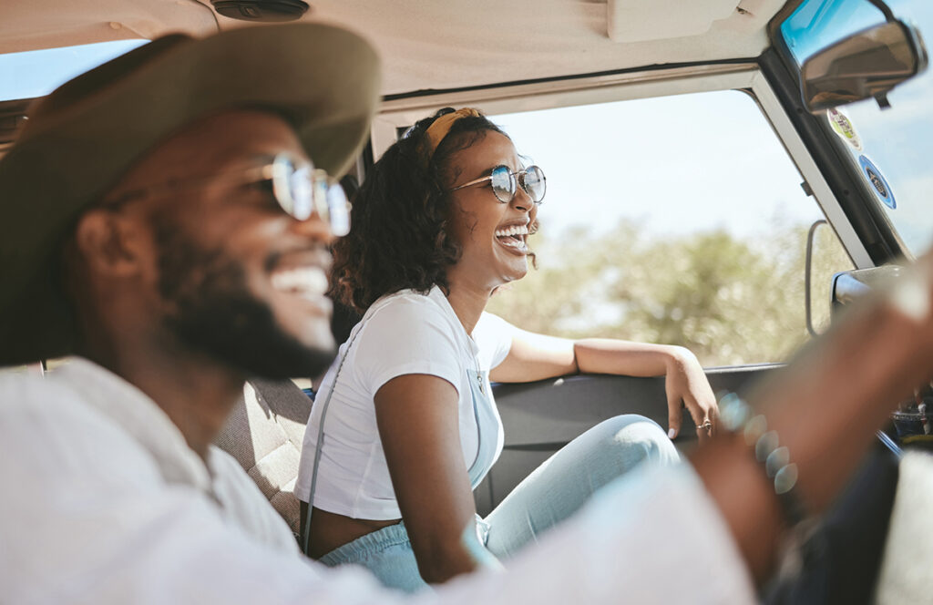 Travel, Road Trip And Black People Couple Driving By Countryside For Holiday, Journey And Freedom With Happiness. Trendy Sunglasses, Fashion And Gen Z Friends In A Car Drive For Vacation Lifestyle