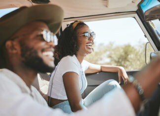 Travel, Road Trip And Black People Couple Driving By Countryside For Holiday, Journey And Freedom With Happiness. Trendy Sunglasses, Fashion And Gen Z Friends In A Car Drive For Vacation Lifestyle