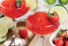 Frozen Strawberry Daiquiri Cocktail With Strawberries And Lime