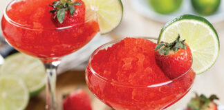 Frozen Strawberry Daiquiri Cocktail With Strawberries And Lime