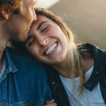 Romantic Boyfriend Kissing On Happy Girlfriend's Forehead