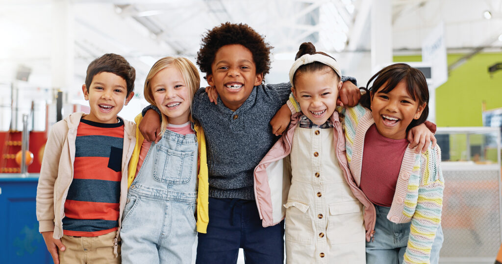 Science, Portrait And Group Of Children With Happiness At Convention, Expo Or Exhibition For Workshop. Student, Kid Or Face With Smile At Tradeshow Or Scientific Conference For Knowledge Or Education